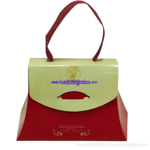 deep red and yellow handle bags for gifts